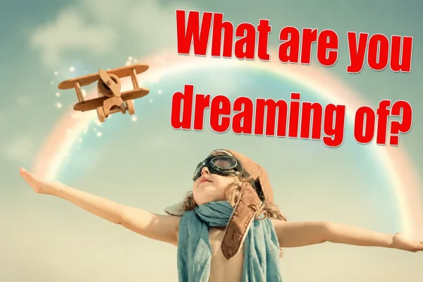 A young child wearing pilot goggles dreaming of travel and private tours in Egypt by WawelEG